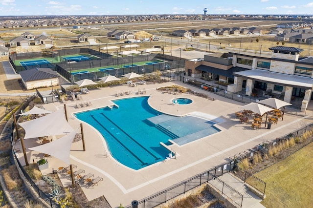 view of pool featuring area for grilling