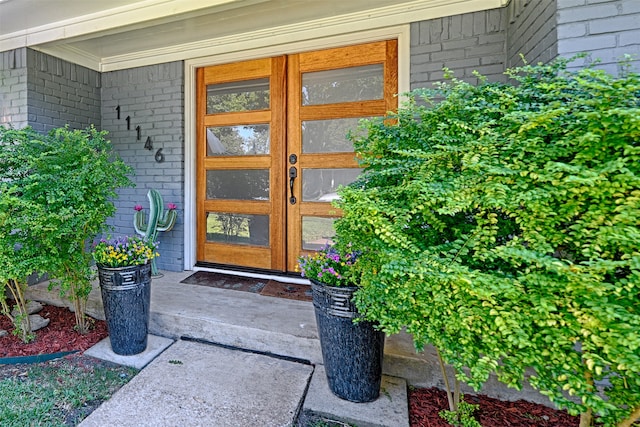 entrance to property featuring french doors