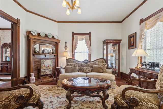 903 N College St, Mckinney, TX 75069 - sitting room with baseboards, crown molding, wood finished floors, and a chandelier
