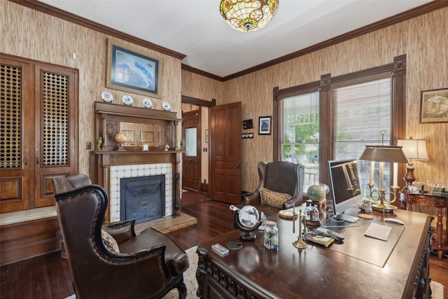 office with ornamental molding, a fireplace, and dark hardwood / wood-style flooring