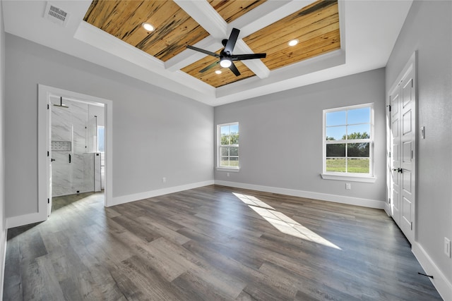 spare room with hardwood / wood-style floors, plenty of natural light, ceiling fan, and wood ceiling