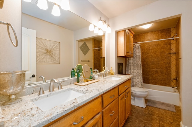 full bathroom featuring shower / tub combo with curtain, tile patterned flooring, vanity, and toilet