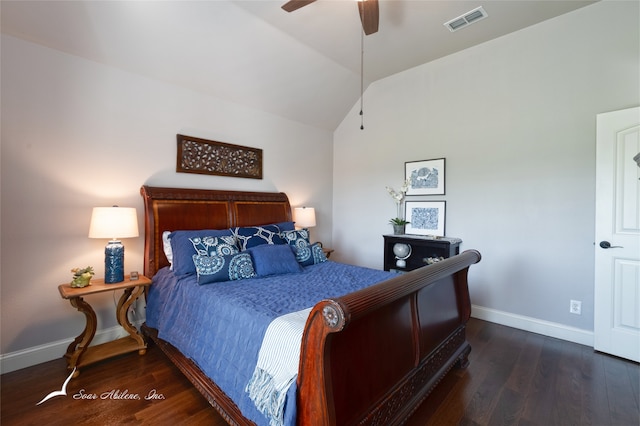 bedroom featuring lofted ceiling, dark hardwood / wood-style floors, and ceiling fan