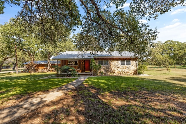 ranch-style home with a front yard