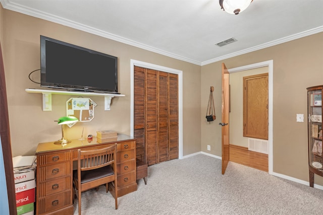 carpeted office featuring crown molding