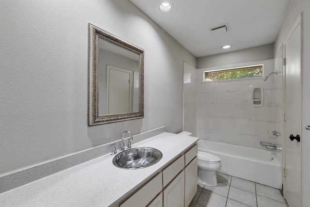 full bathroom featuring tile patterned floors, vanity,  shower combination, and toilet