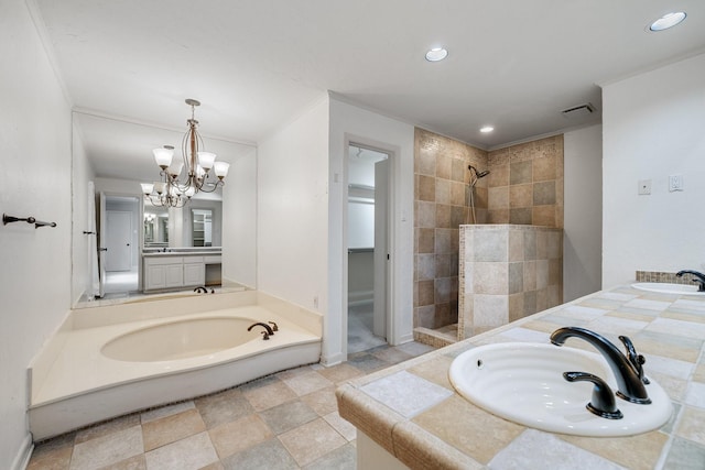 bathroom with a chandelier, shower with separate bathtub, vanity, and ornamental molding