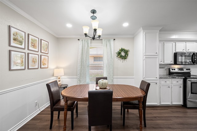 dining room with ornamental molding, a notable chandelier, and dark wood-type flooring