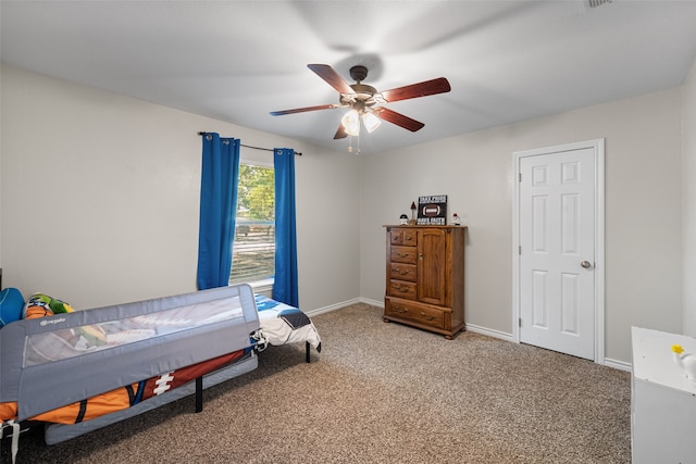 bedroom with ceiling fan and carpet floors