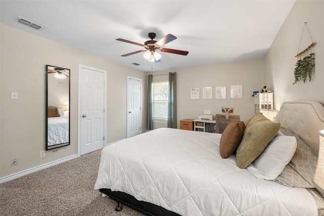 carpeted bedroom with ceiling fan