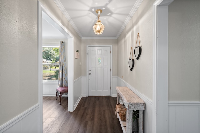 entryway featuring crown molding and dark hardwood / wood-style flooring