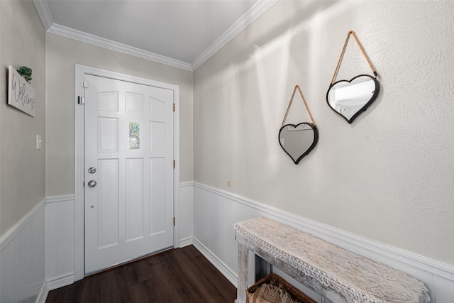 entryway featuring ornamental molding and dark hardwood / wood-style flooring