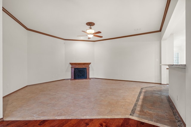 unfurnished living room featuring ceiling fan, light hardwood / wood-style floors, and ornamental molding