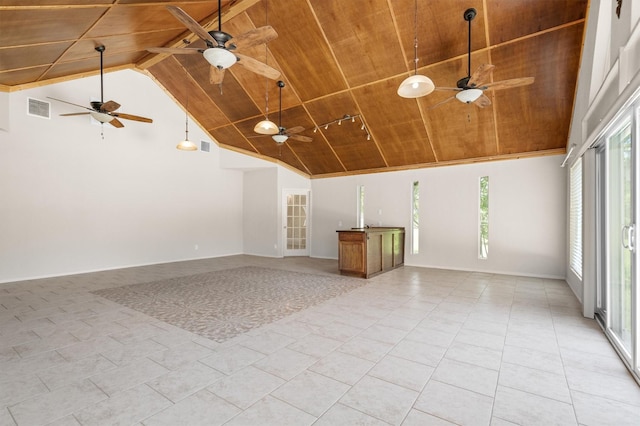 7710 Valley Ridge Dr, Northlake, TX 76247 - empty room featuring wooden ceiling, high vaulted ceiling, ceiling fan, light tile patterned flooring, and baseboards
