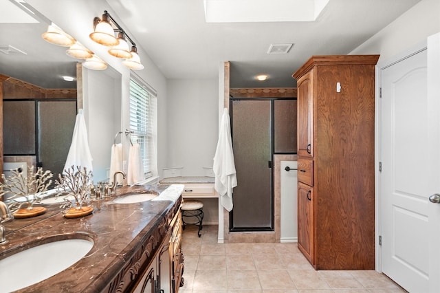 7710 Valley Ridge Dr, Northlake, TX 76247 - bathroom featuring a stall shower, double vanity, and tile patterned flooring