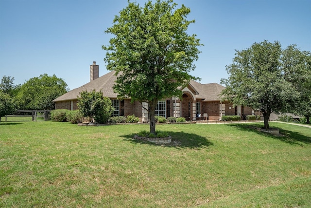 7710 Valley Ridge Dr, Northlake, TX 76247 - view of property hidden behind natural elements featuring a chimney and brick siding