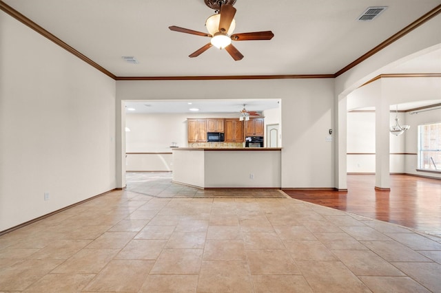 7710 Valley Ridge Dr, Northlake, TX 76247 - unfurnished living room featuring a chandelier, ceiling fan, ornamental molding, baseboards, and light tile patterned flooring