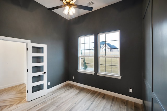 unfurnished bedroom featuring light hardwood / wood-style floors and ceiling fan