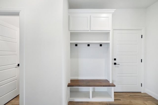 mudroom with light hardwood / wood-style flooring