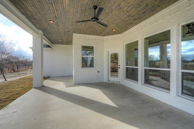 view of patio featuring ceiling fan