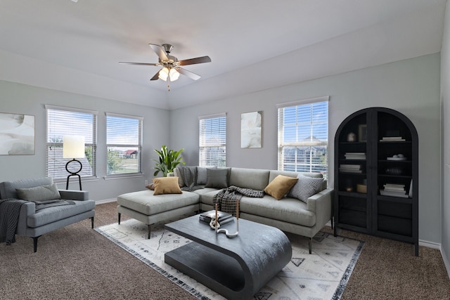 living room featuring ceiling fan and light colored carpet