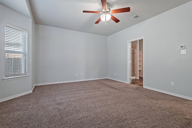 unfurnished room with carpet flooring and ceiling fan