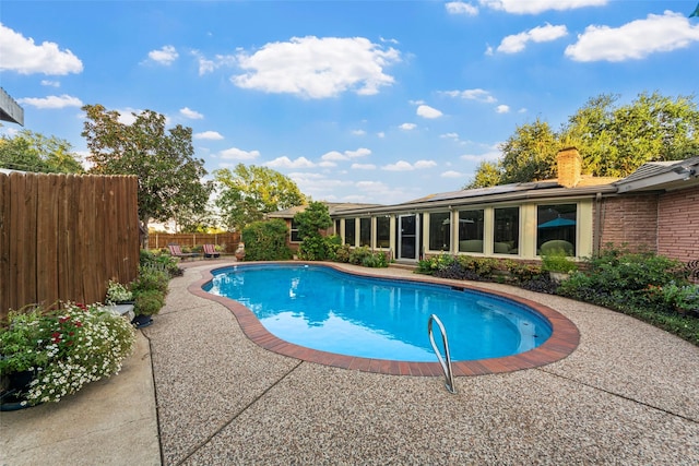 view of pool with a patio area