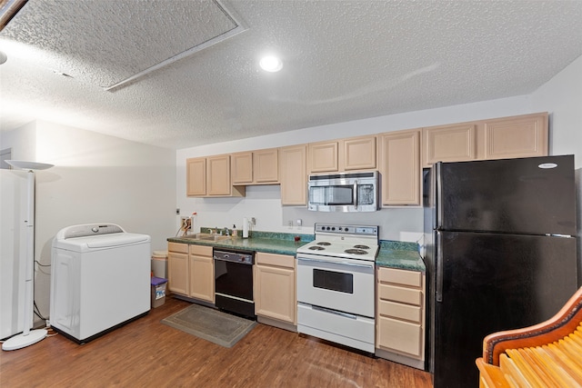 kitchen with washer / clothes dryer, sink, black appliances, a textured ceiling, and dark hardwood / wood-style flooring