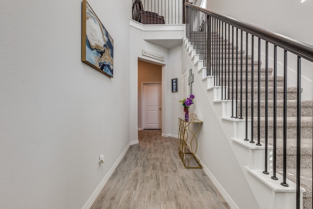 hallway with light wood-type flooring