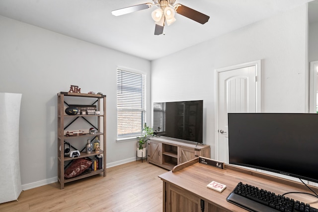 office space with ceiling fan and light hardwood / wood-style floors