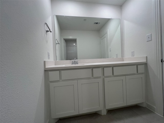 bathroom featuring vanity and tile patterned floors