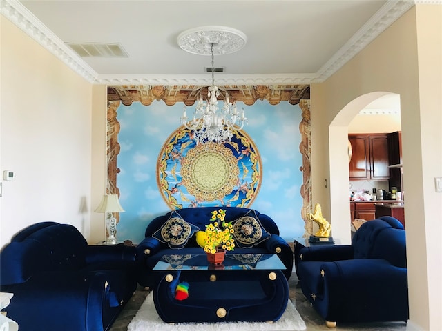 living room featuring ornamental molding and a chandelier