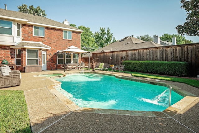 view of pool featuring a patio area