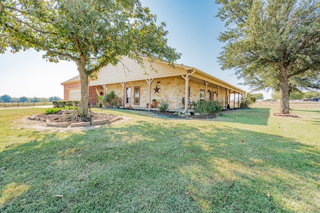 exterior space featuring a front yard and a garage