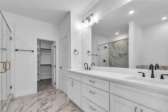 bathroom with vanity and an enclosed shower