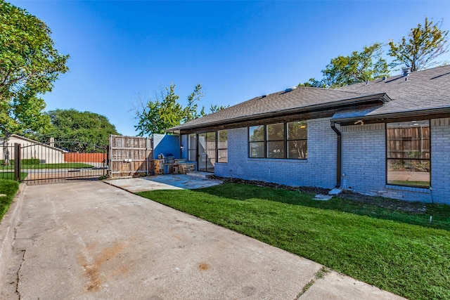 exterior space with a yard