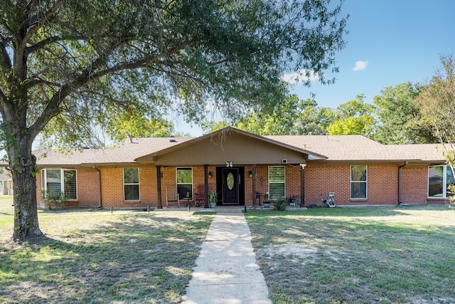 ranch-style house with a front lawn