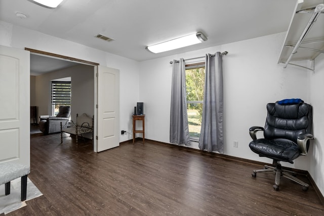 living area with dark hardwood / wood-style flooring