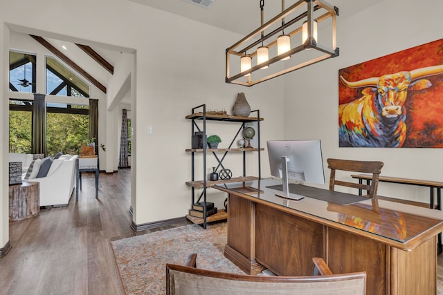 office area with beam ceiling, dark hardwood / wood-style flooring, and high vaulted ceiling