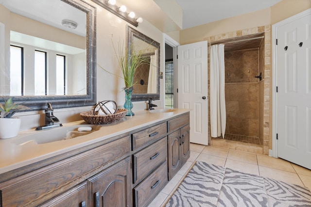 bathroom with vanity, tile patterned flooring, and a shower with curtain