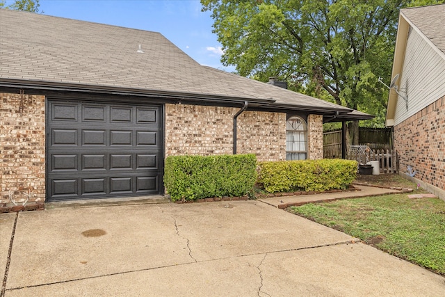 exterior space featuring a garage