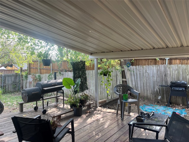 wooden deck with grilling area