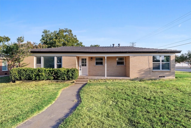 ranch-style home with a front lawn