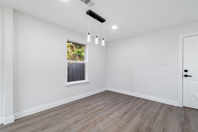 empty room featuring light hardwood / wood-style floors