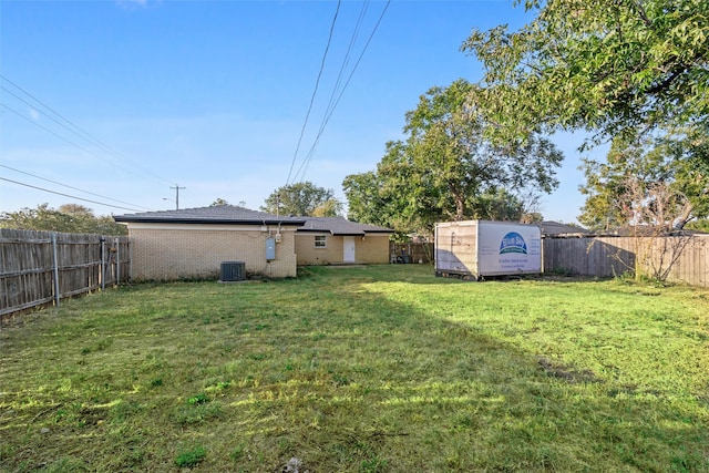 view of yard featuring central AC