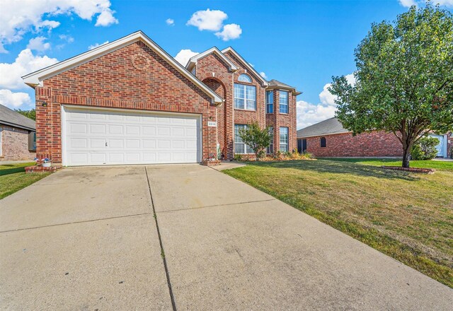 rear view of property featuring a storage unit, a lawn, a hot tub, and a patio area