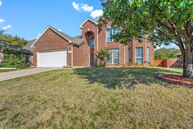 view of front property with a front lawn and a garage