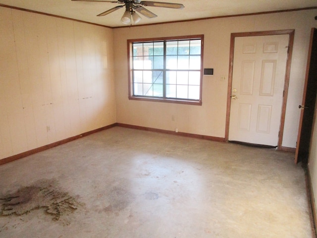 unfurnished room featuring ornamental molding and ceiling fan