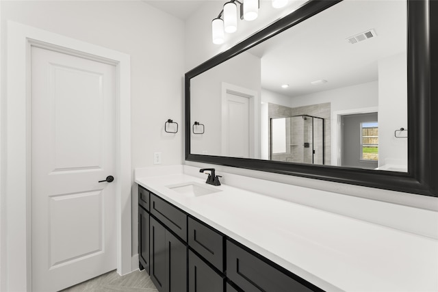 bathroom featuring vanity and walk in shower