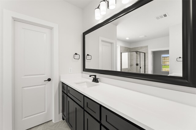 2614 Shadybrook Dr, Celina, TX 75009 - bathroom with vanity, a shower stall, and visible vents